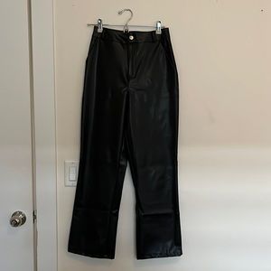 High waisted straight black leather pants.
